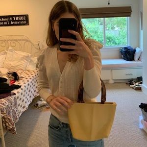 Tan purse tortoise shell clasps